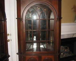 There are 2 corner cabinets, but only one is for sale.  We are using the matching one for display only.