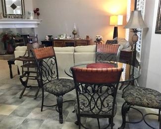Glass top metal table with chairs