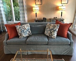 Edward Farrell mohair sofa 82"l x 35"d x 29"h asking $800. Metal and glass table asking $120  gorgeous mirrored tables and lamps also for sale in the background