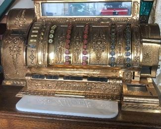 This National register was the top of the line back in 1919! Complete w/ oak cabinet drawers each drawer designated for each cashier, there was no better...