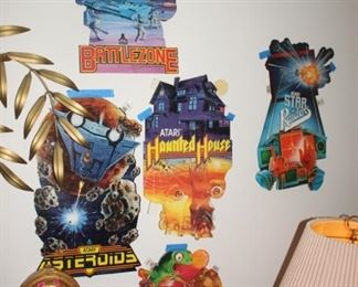 Original Atari wall decorations.  Cardboard, original 1980's.  Most all the popular games.  Asteroids, Haunted House,  Centipede....(ALL AS NEW).  
