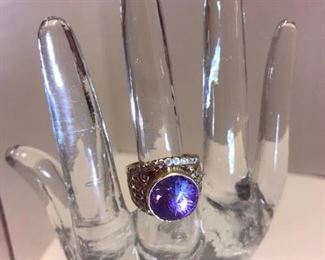 21. Ring 14kt yellow gold, Amethyst flower cut round setting with small diamonds. Size 5 3/4”