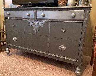Painted silver/gray chest.