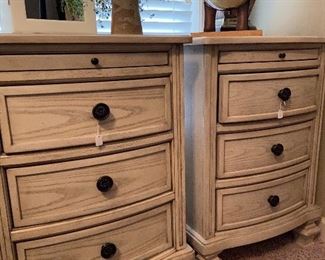 Matching nightstands for bed.  Each has pull out table top and interior electric station.