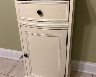 I believe we have two of these great cabinets, perfect for bathroom storage.  Looks like Pottery Barn, but can't find manufacturer name