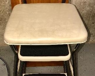 Did you have one of these chairs growing up?  I remember my mother sitting each one of us down on this and cutting our hair!  My bangs looked like she put a bowl on my head - mortified!