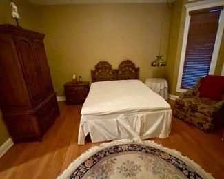 Queen bed, wardrobe, headboard, two upholstered chairs and a night stand - furniture by Thomasville