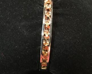 Topaz in sterling and platinum metal