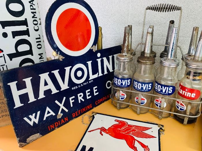 Dozens of Gas & Oil porcelain signs and memorabilia. Havoline WaxFree Oil