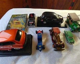 Eight Model Toy Cars and 1962 to 1973 Volkswagen Handbook Lot