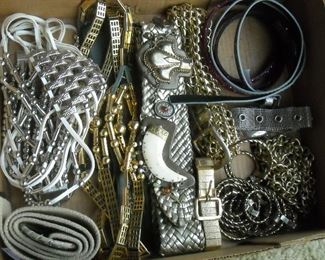 Lots of designer belts and accessories