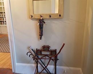 Vintage stand with canes, mirror with hooks