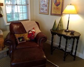 Matching chair and ottoman to the Sofa.  Vintage 6-legged table, Decorative items, including the framed textiles.