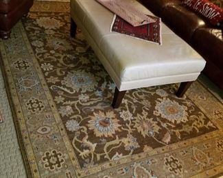 Oversize ottoman on an Oriental Style rug