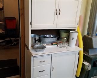 Cool kitchen cabinet.  Garden items