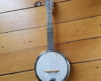 Vintage "Dixie" chrome banjo, comes with protective case.  Excellent condition.