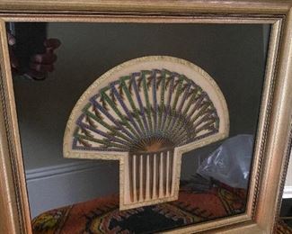 Beautifully framed Antique hair comb. Comb is about 8.5” across