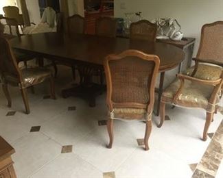 Table w/8-Cane Back Chairs in pristine condition.