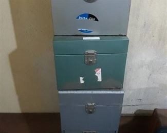 Three metal file storage boxes