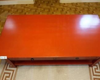 Red wooden coffee table