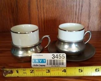 Set of two pewter cups with inserts