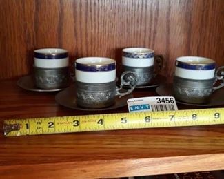 Set of 4 pewter cups with inserts