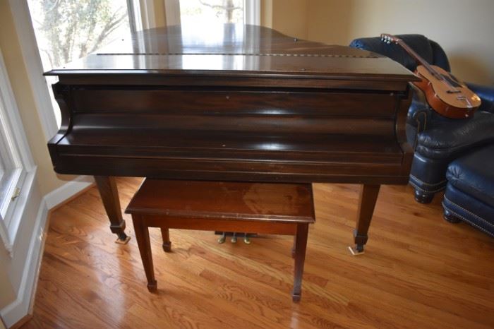 Beautiful Hardman Peck Standard Baby Grand Piano. Hardman Peck was a piano manufacturer established in New York City in 1842 by Hugh Hardman. Hugh's brother John joined the company in 1874 and Leopold Peck became a partner in 1890. In 1890 the name was changed to Hardman, Peck & Co.  Hardman was considered one of the distinguished piano manufacturers of this era, with a worldwide reputation for the utmost in reliability. Hardman pianos were noted for their technical qualities, for their purity, delicacy, the artistic beauty of their cases, and for their remarkable durability. Hardman pianos were once the official piano of the Metropolitan Opera Company in New York. The serial number on this piano identifies it as being manufactured between 1947  and 1952