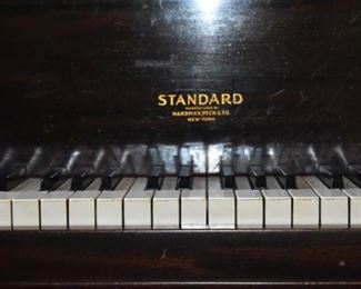 Beautiful Hardman Peck Standard Baby Grand Piano. Hardman Peck was a piano manufacturer established in New York City in 1842 by Hugh Hardman. Hugh's brother John joined the company in 1874 and Leopold Peck became a partner in 1890. In 1890 the name was changed to Hardman, Peck & Co.  Hardman was considered one of the distinguished piano manufacturers of this era, with a worldwide reputation for the utmost in reliability. Hardman pianos were noted for their technical qualities, for their purity, delicacy, the artistic beauty of their cases, and for their remarkable durability. Hardman pianos were once the official piano of the Metropolitan Opera Company in New York. The serial number on this piano identifies it as being manufactured between 1947  and 1952