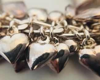 Sterling Heart Charm Bracelet and Matching Earrings https://ctbids.com/#!/description/share/291662