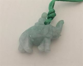 Green Jade Elephant Pendant on Silk Cord https://ctbids.com/#!/description/share/291667