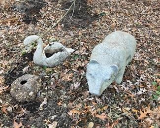 Cement and limestone garden statues.  Carved granite bear.