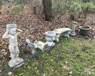 Limestone bench, cement statues, planters