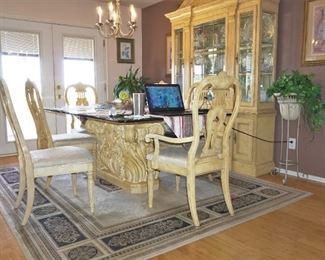 Dining room table, chairs, and cabinet