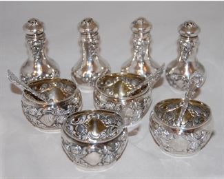 12 pc. Set of Sterling Silver Salt Cellars with Spoons and Pepper Shakers