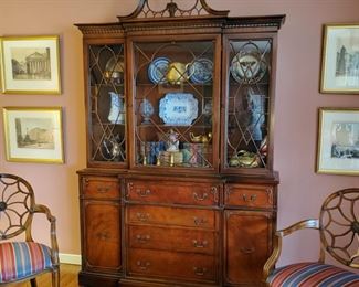 Lammerts mahogany breakfront with secretary drawer and eagle finial