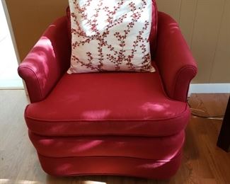One of a pair red armchairs