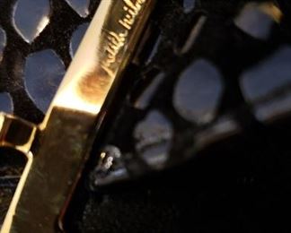 Clasp of Judith Leiber bag