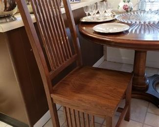 Two oak side chairs
