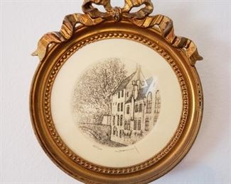 Close up of one of the collage of etchings in the family room