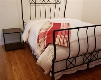 Metal Queen sized bed and a metal square side table