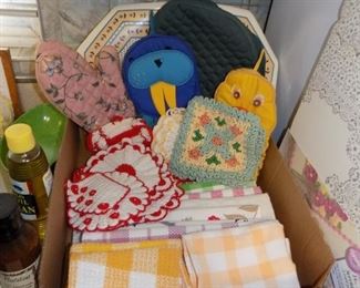 Hand made pot holders, kitchen towels