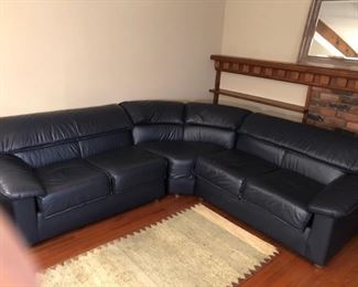 Navy blue leather sectional.