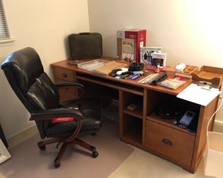 Another office desk and chair.