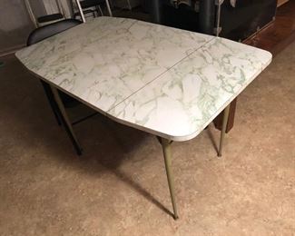 Vintage formica drop leaf table no chairs.