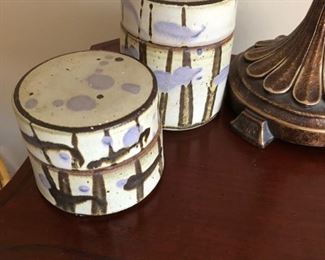 Mid Century William Cruets lidded pottery boxes.