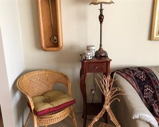 Howard Miller Arthur Umanoff pendulum clock,  cute wicker chair and a great basket!