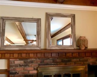 Two beautiful brand new beveled mirrors.