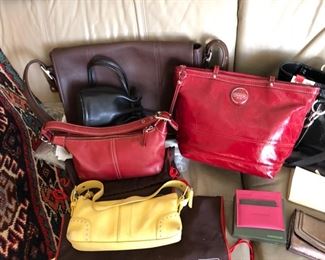 Coach and Kate Spade purses and wallets.