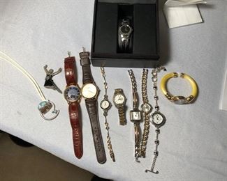 Various watches including Citizen, Movado and Brighton.