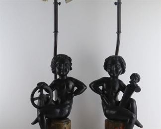 Pair of Italian Carved Puttis Mounted as Lamps